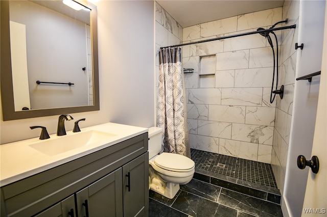 bathroom featuring vanity, a shower with shower curtain, and toilet