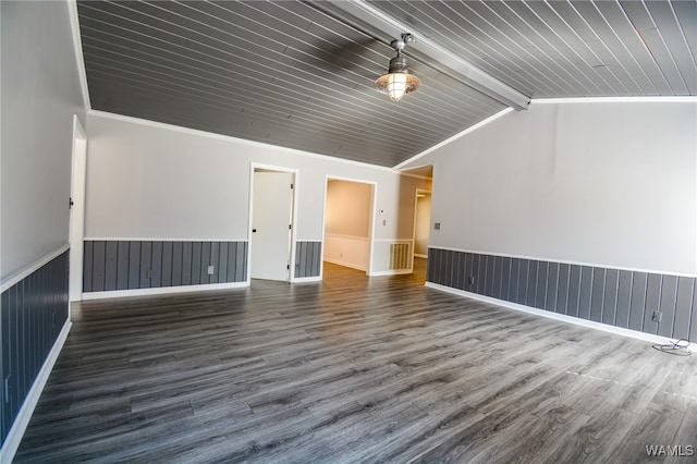 unfurnished room with vaulted ceiling with beams, dark hardwood / wood-style flooring, wood ceiling, and crown molding