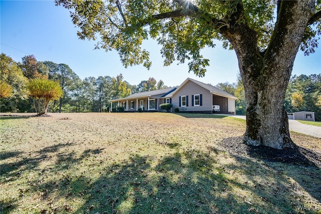 ranch-style home with covered porch