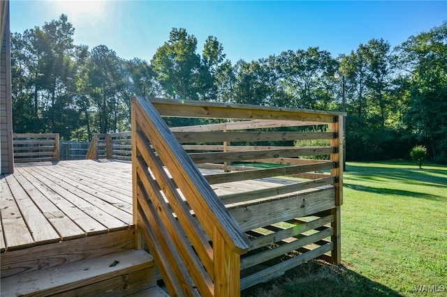 wooden deck with a yard