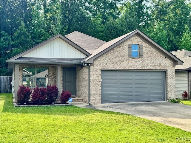 6643 Cooperstown Cir, Tuscaloosa, AL 35453 - ranch-style home with brick siding, an attached garage, driveway, and board and batten siding