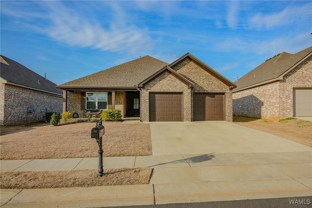 view of front facade featuring an attached garage, roof with shingles, concrete driveway, and brick siding