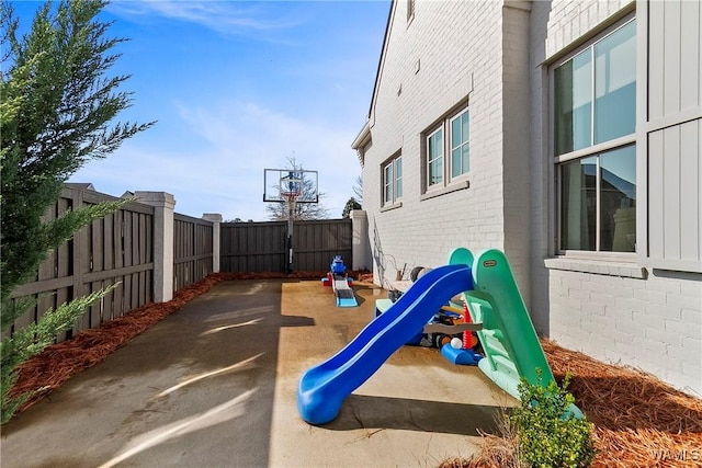 view of playground with fence