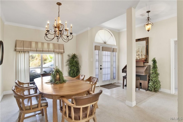 dining space with light colored carpet, crown molding, baseboards, and light tile patterned floors