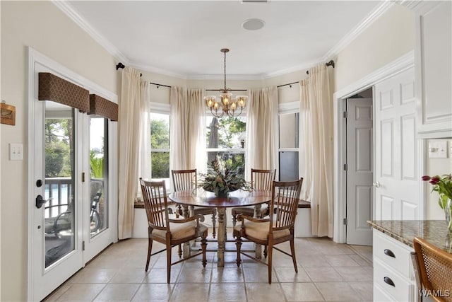 dining space featuring light tile patterned flooring, crown molding, and an inviting chandelier