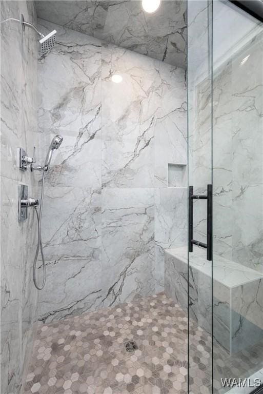 1300 Paul W Bryant Dr Unit 100, Tuscaloosa, AL 35401 - bathroom featuring a marble finish shower