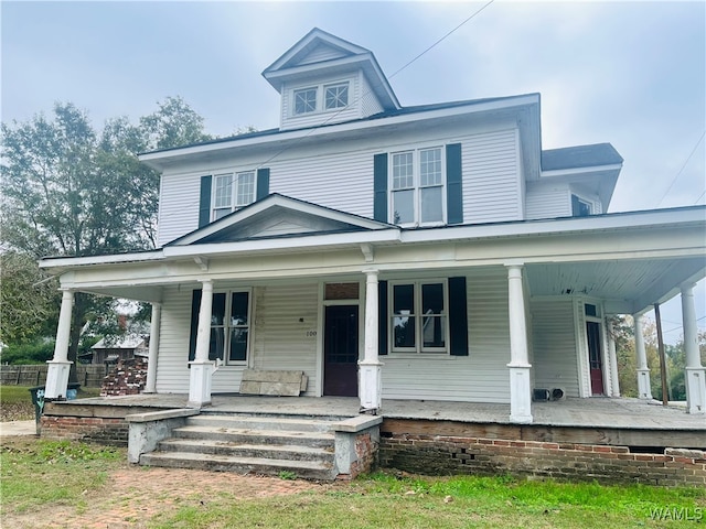 view of front of property featuring covered porch