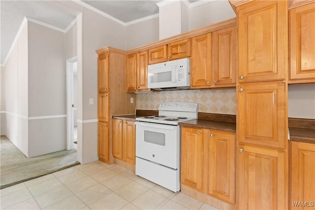 10463 Beulah Lake Ln, Cottondale, AL 35453 - kitchen featuring white appliances, dark countertops, backsplash, light tile patterned floors, and a textured ceiling