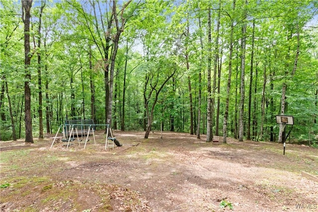 10463 Beulah Lake Ln, Cottondale, AL 35453 - view of yard with a playground and a view of trees