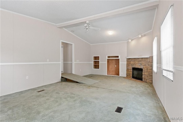 10463 Beulah Lake Ln, Cottondale, AL 35453 - unfurnished living room featuring a fireplace, carpet floors, a ceiling fan, and ornamental molding