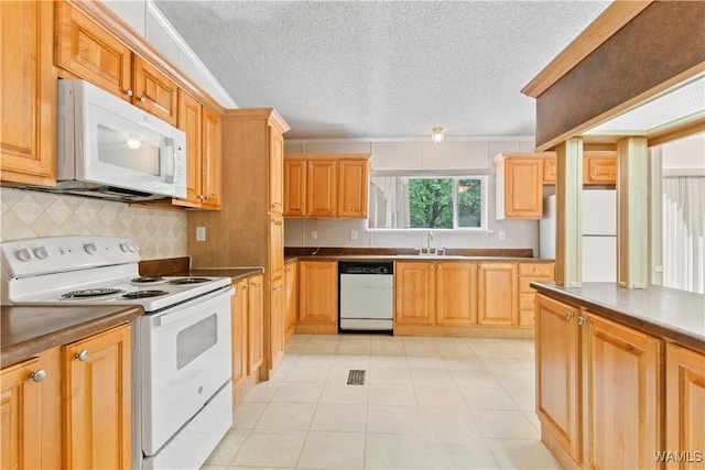 10463 Beulah Lake Ln, Cottondale, AL 35453 - kitchen featuring white appliances, a textured ceiling, a sink, tasteful backsplash, and ornamental molding