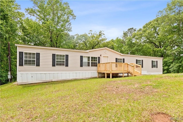 10463 Beulah Lake Ln, Cottondale, AL 35453 - back of property with a yard, a wooden deck, and view of scattered trees