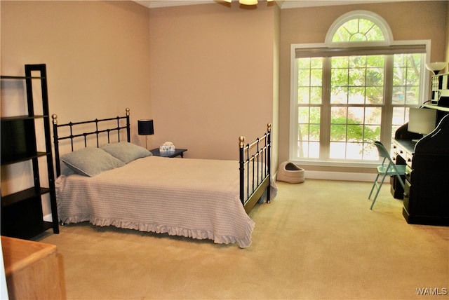 carpeted bedroom featuring ornamental molding