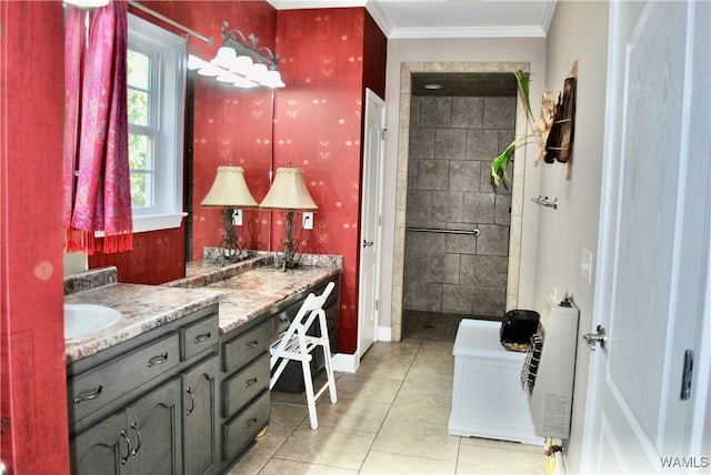 bathroom with vanity, tile patterned floors, and crown molding