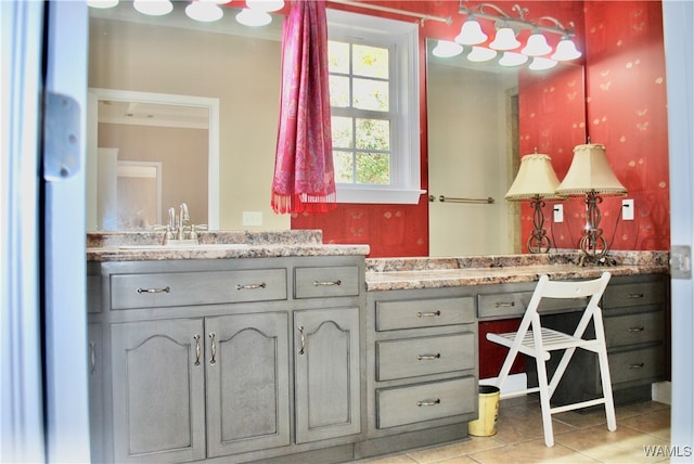 bathroom featuring tile patterned floors and vanity