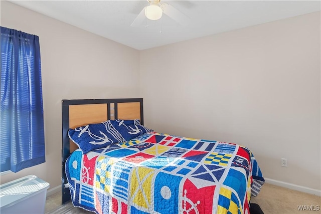 bedroom featuring ceiling fan and carpet flooring