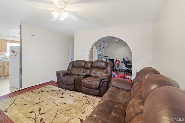 living room with ceiling fan