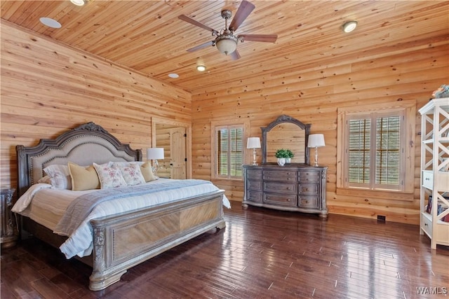 bedroom with multiple windows, wood ceiling, and wood-type flooring