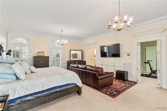 carpeted bedroom with an inviting chandelier and ornamental molding