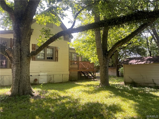 view of yard featuring a deck