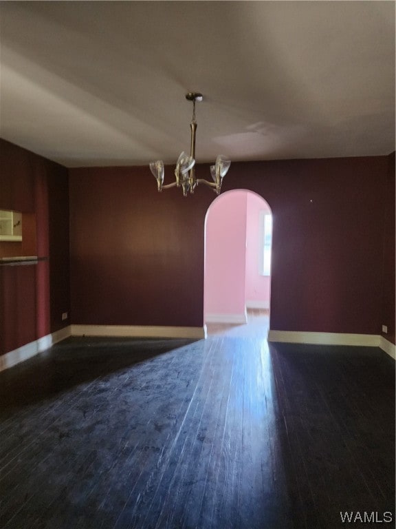 unfurnished dining area with dark hardwood / wood-style flooring