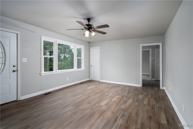 foyer entrance featuring dark hardwood / wood-style flooring and ceiling fan