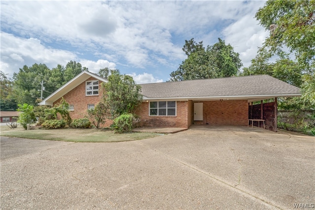 view of front facade with a carport