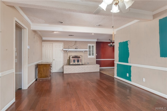 unfurnished living room featuring a textured ceiling, dark hardwood / wood-style floors, and crown molding