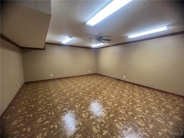10882 Tingle Tangle Rd, Vance, AL 35490 - basement with a textured ceiling