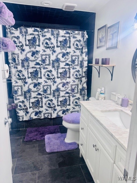 full bath with vanity, toilet, and a shower with shower curtain