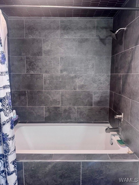 full bath with shower / bath combination with curtain