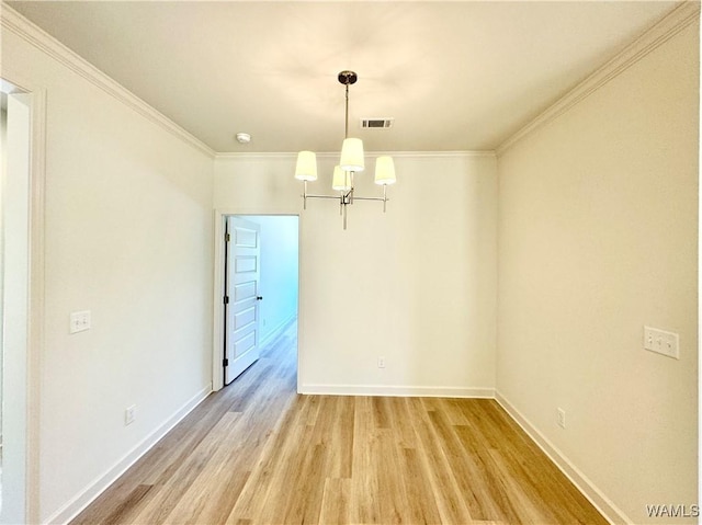 unfurnished dining area featuring crown molding and light hardwood / wood-style flooring