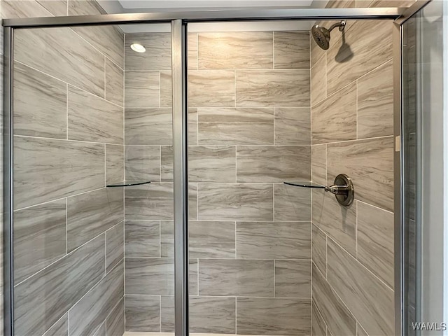 bathroom with an enclosed shower