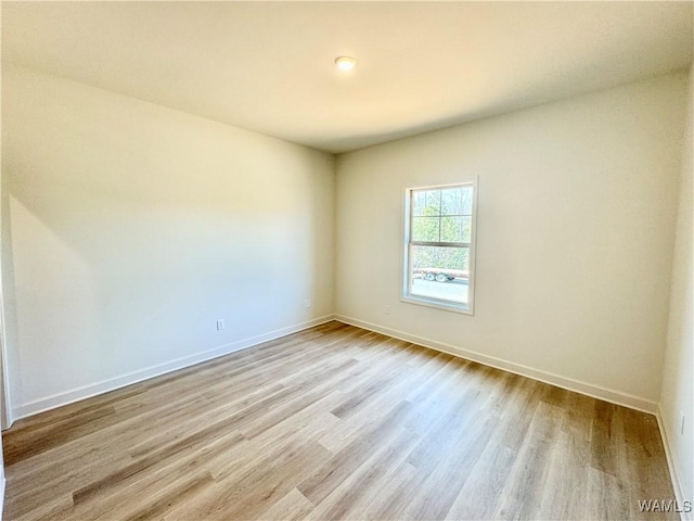 empty room featuring light hardwood / wood-style floors