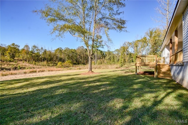 view of yard featuring a deck