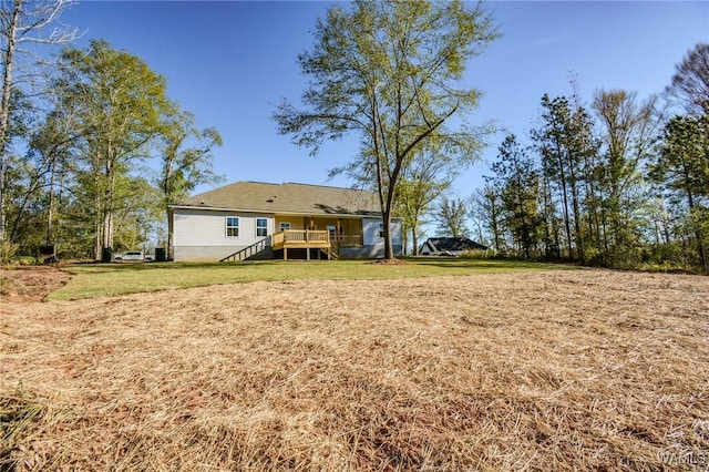 view of yard featuring a wooden deck