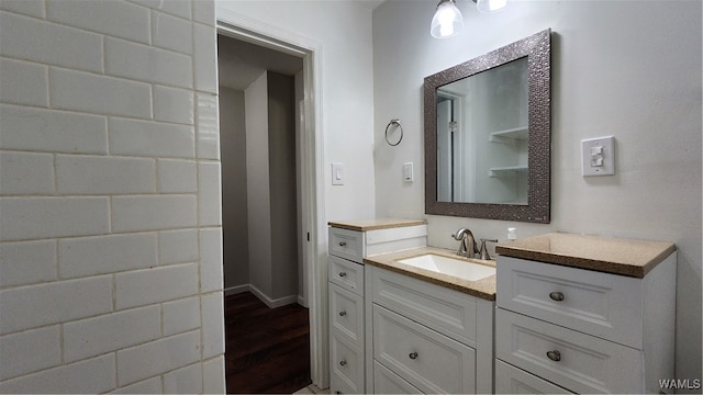 bathroom with wood-type flooring and vanity