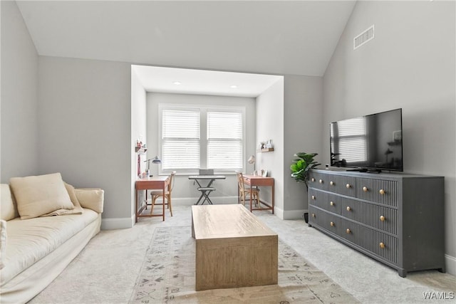 5377 Alexander Ave, Tuscaloosa, AL 35406 - living area featuring carpet floors and lofted ceiling
