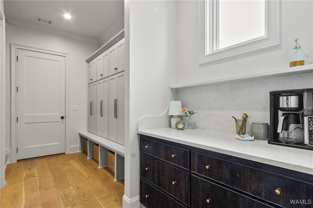 5377 Alexander Ave, Tuscaloosa, AL 35406 - mudroom featuring light wood finished floors and crown molding