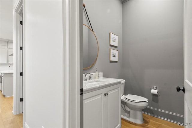 5377 Alexander Ave, Tuscaloosa, AL 35406 - bathroom with wood finished floors and vanity