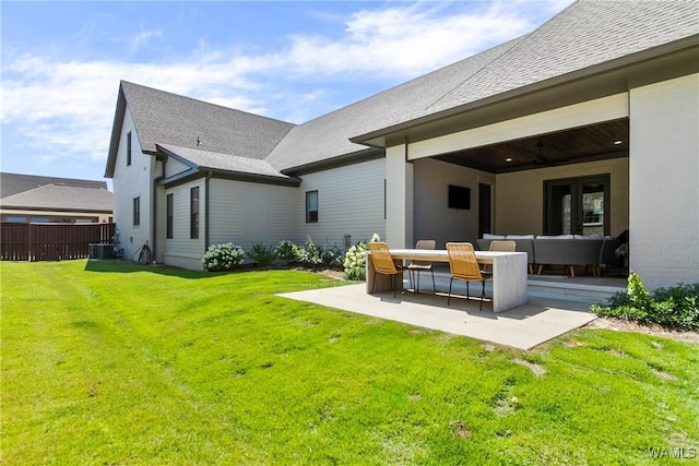 5377 Alexander Ave, Tuscaloosa, AL 35406 - rear view of house featuring a patio, roof with shingles, and ceiling fan