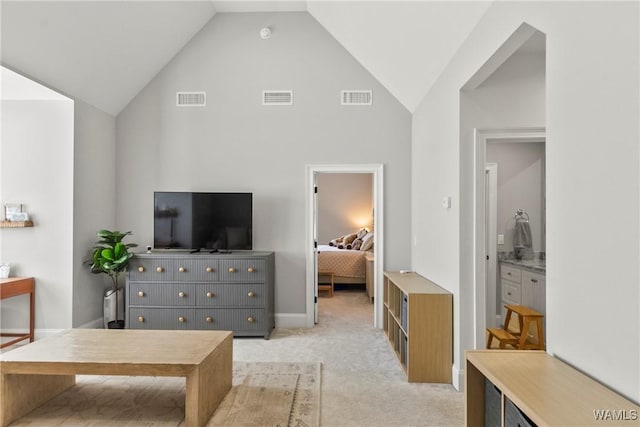 5377 Alexander Ave, Tuscaloosa, AL 35406 - living room with light carpet and high vaulted ceiling