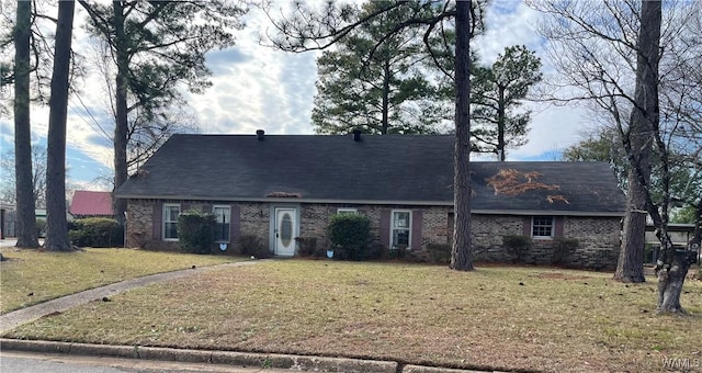 single story home with a front yard