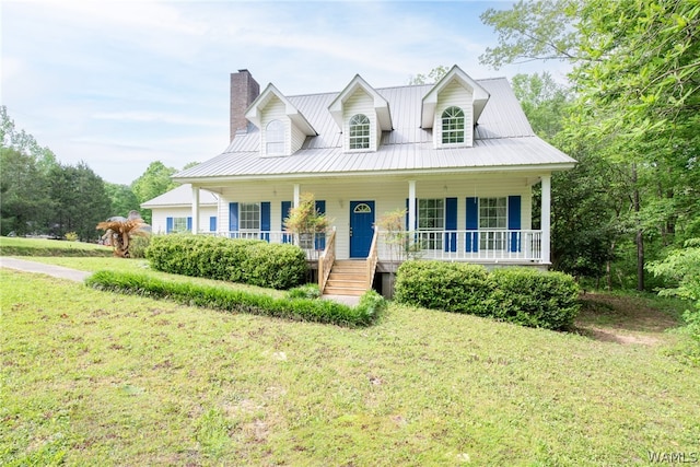 view of front of home with a porch and a front yard