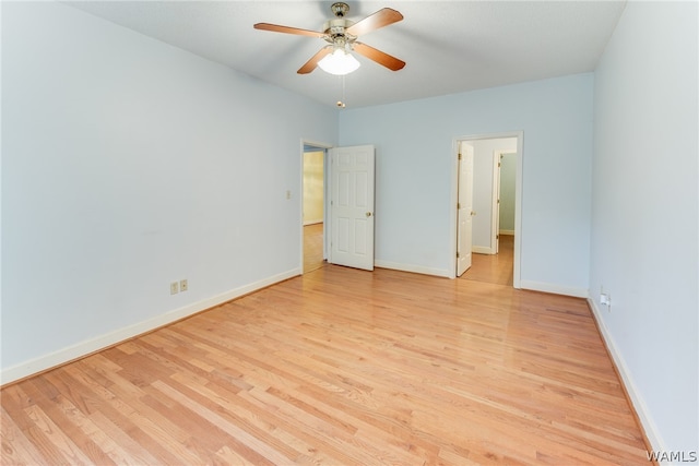 unfurnished bedroom with ceiling fan and light hardwood / wood-style floors