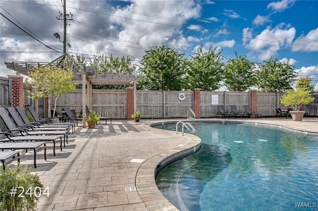 view of swimming pool with a fenced in pool, a fenced backyard, and a patio