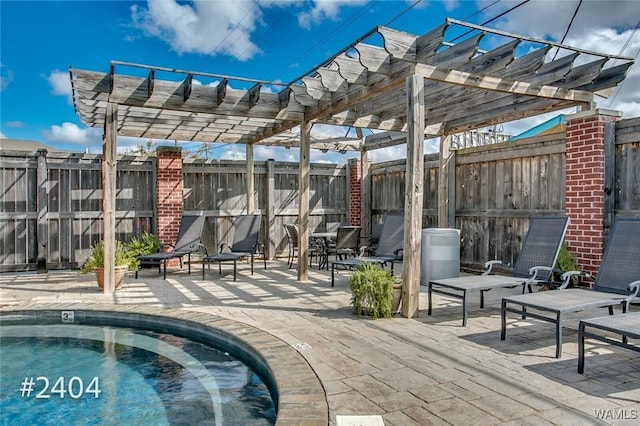 view of patio featuring fence and a pergola