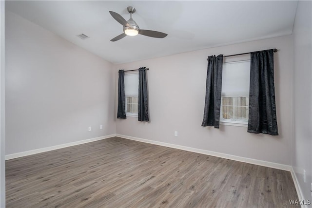 unfurnished room featuring ceiling fan and wood-type flooring