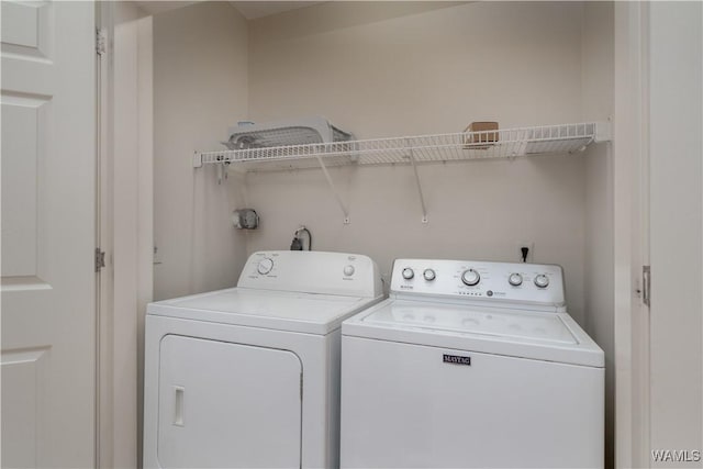 laundry room featuring independent washer and dryer