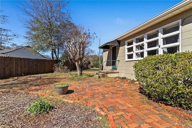 view of patio with fence